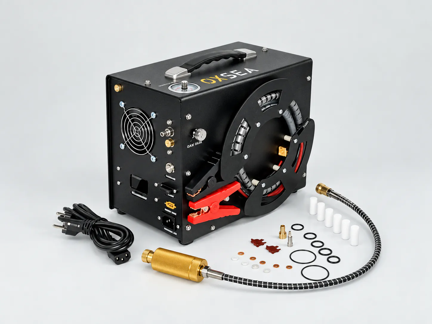 The OXSEA Mini Compressor with its handle, hose, and battery clips
